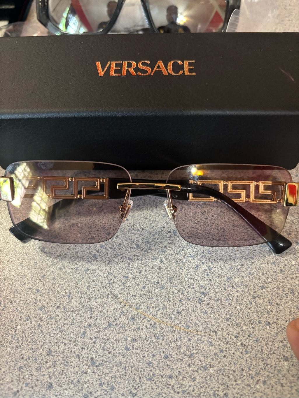 Versace Men's Rimless Sunglasses In Black And Gold